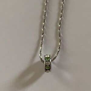 Elegant Silver Necklace with Green Accents